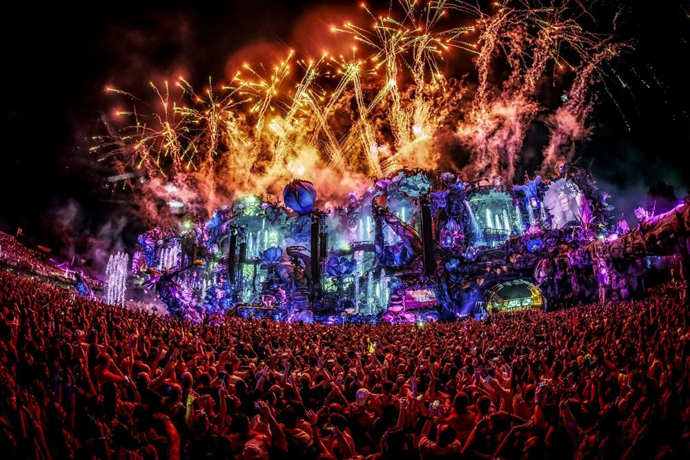 Tomorrowland mainstage with fireworks over a packed crowd at night